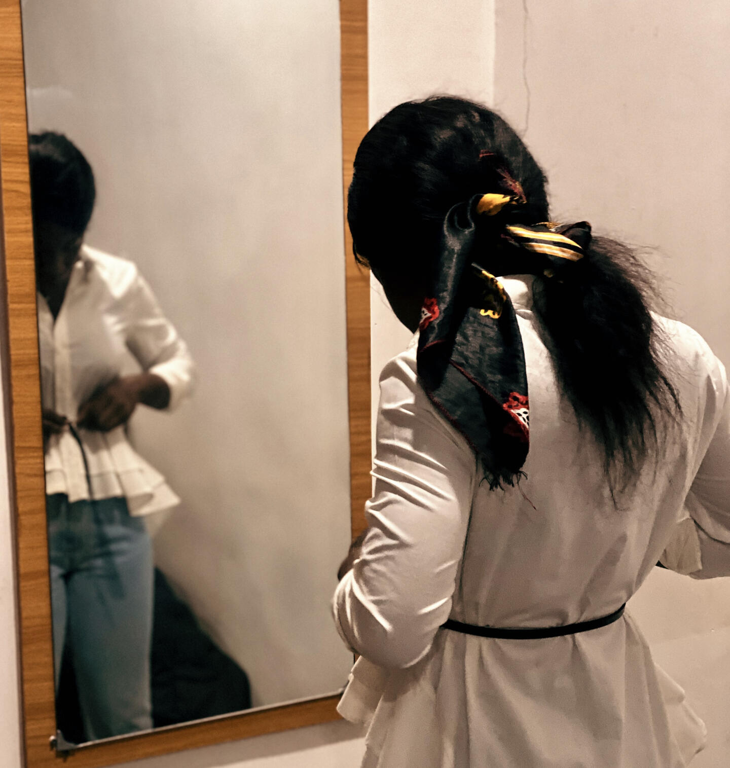 Lady Getting Dressed In Front of Mirror